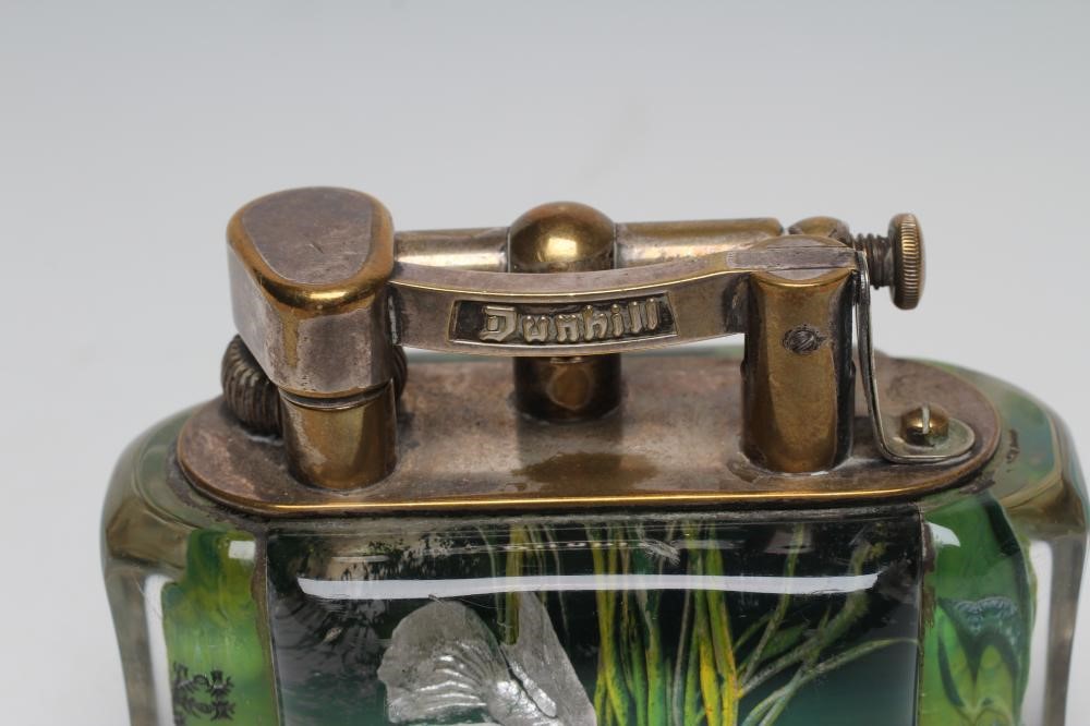 A DUNHILL LUCITE AQUARIUM TABLE LIGHTER by Margaret Bennett Image