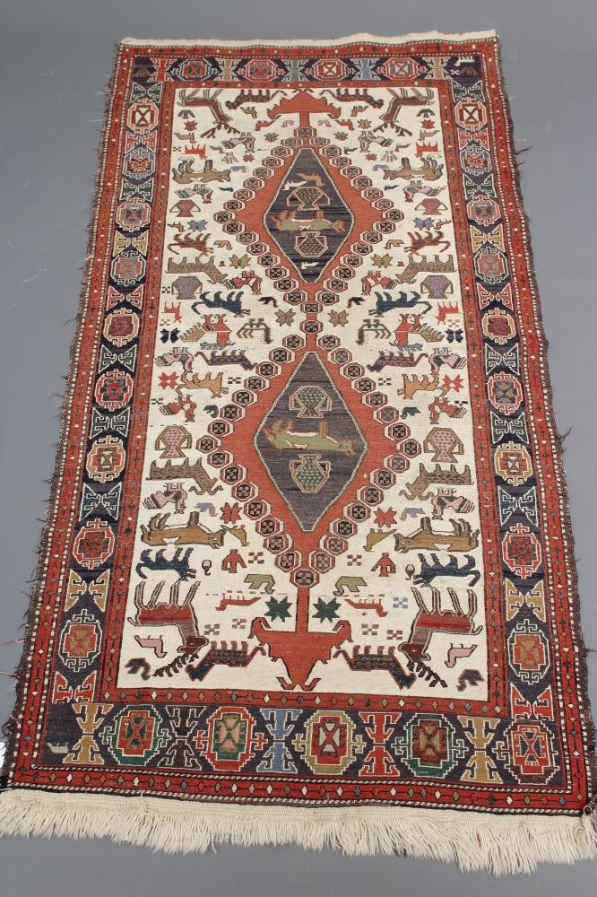 A PERSIAN TRIBAL RUG Image