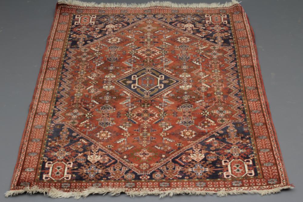 A PERSIAN TRIBAL RUG Image