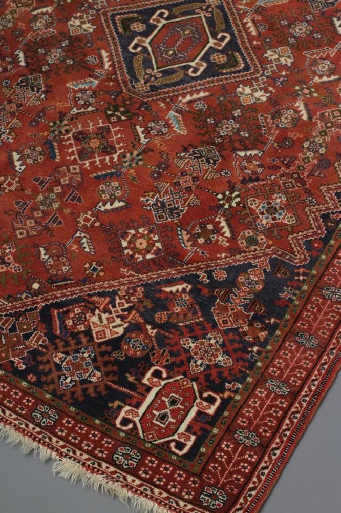 A PERSIAN TRIBAL RUG Image
