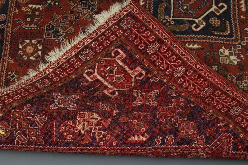 A PERSIAN TRIBAL RUG Image