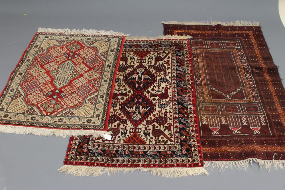 A PERSIAN TRIBAL SMALL RUG Image