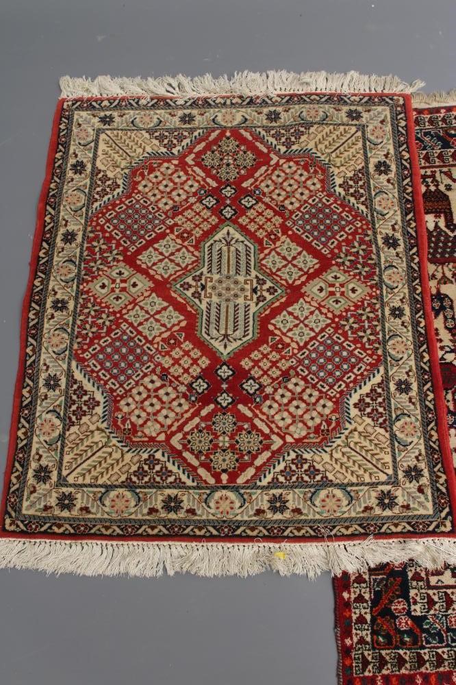 A PERSIAN TRIBAL SMALL RUG Image