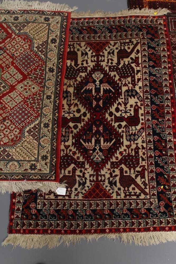A PERSIAN TRIBAL SMALL RUG Image