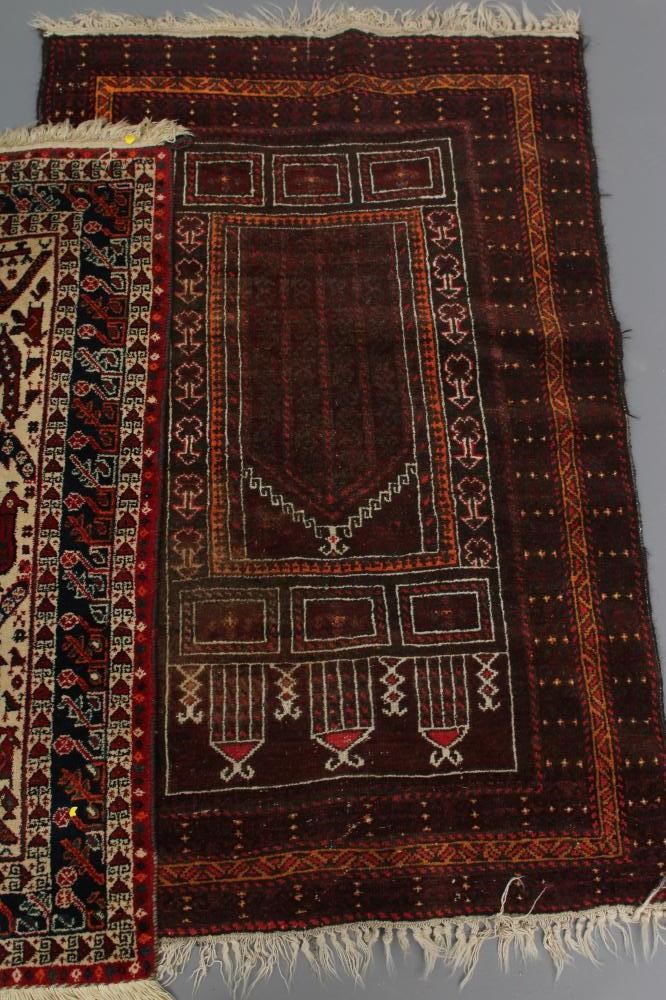 A PERSIAN TRIBAL SMALL RUG Image