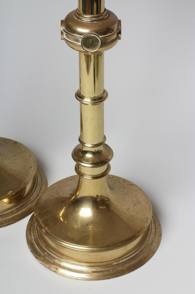 A LARGE PAIR OF ARTS AND CRAFTS BRASS CANDLESTICKS Image
