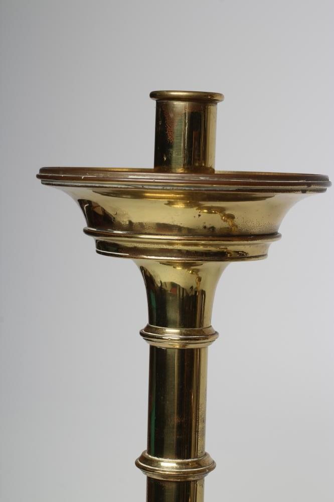 A LARGE PAIR OF ARTS AND CRAFTS BRASS CANDLESTICKS Image