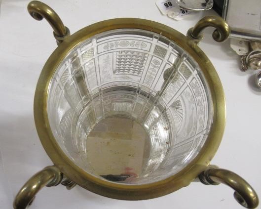 A VICTORIAN BRASS AND GLASS PATENT OIL LAMP of cylindrical form Image