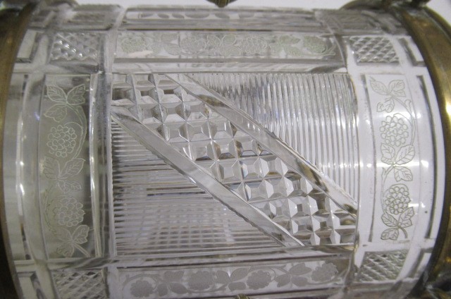 A VICTORIAN BRASS AND GLASS PATENT OIL LAMP of cylindrical form Image