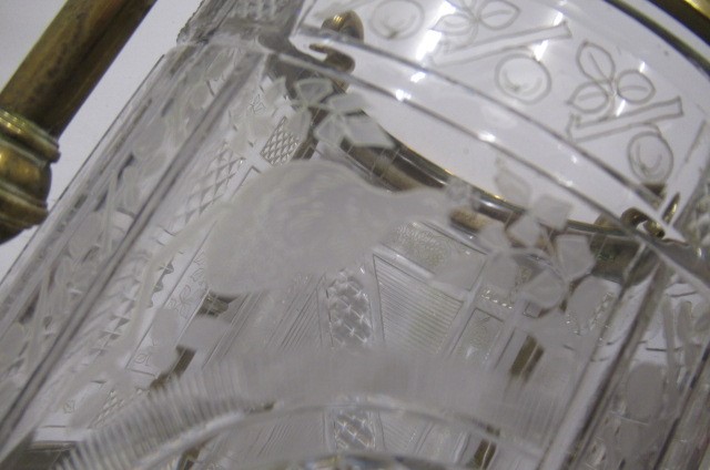 A VICTORIAN BRASS AND GLASS PATENT OIL LAMP of cylindrical form Image