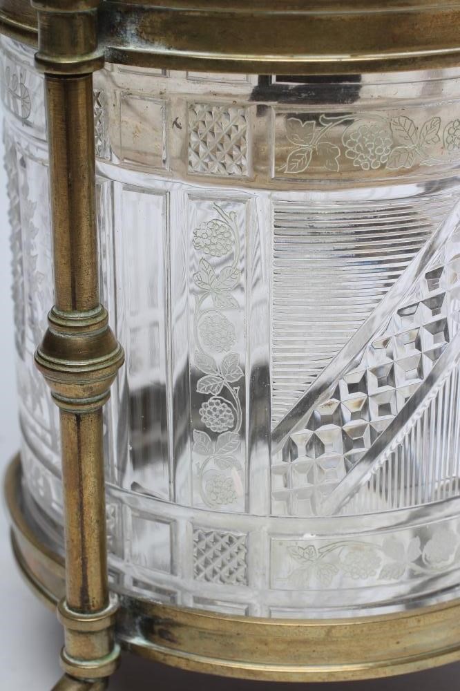 A VICTORIAN BRASS AND GLASS PATENT OIL LAMP of cylindrical form Image