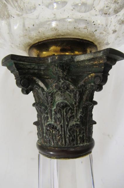 AN EARLY VICTORIAN GLASS OIL LAMP Image