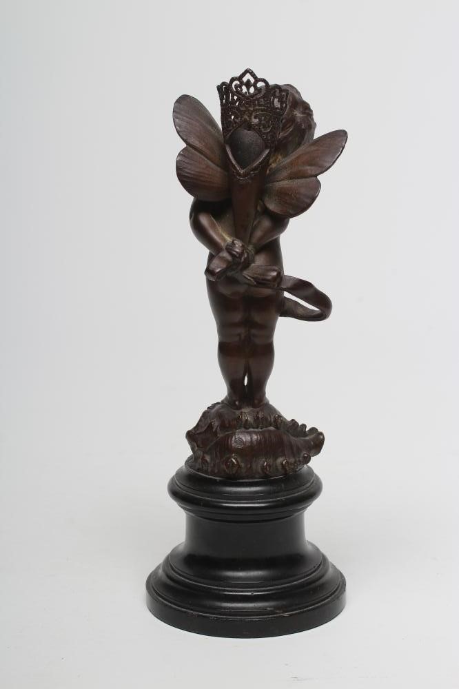 A BRONZE FIGURE OF CUPID Image