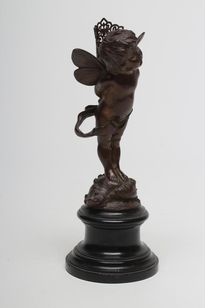 A BRONZE FIGURE OF CUPID Image