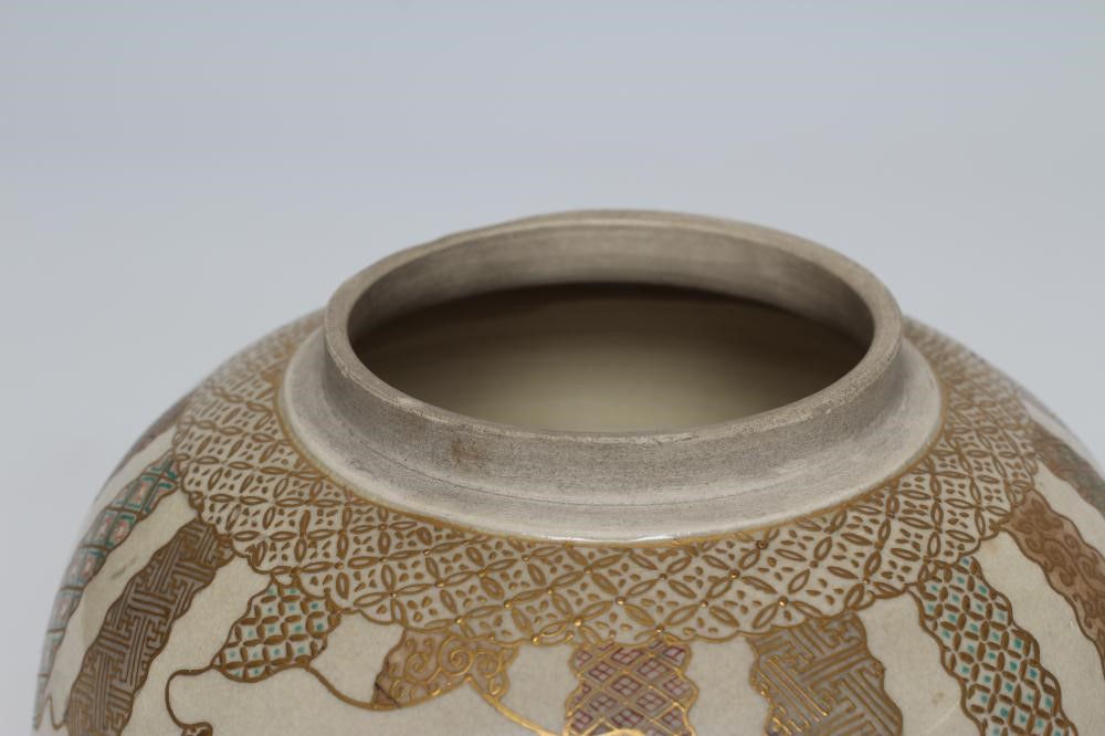 A SATSUMA EARTHENWARE JAR AND COVERS painted in pale palette with two vignettes of three children Image