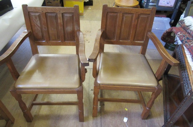 A COLIN ALMACK ADZED OAK DINING SUITE comprising multi panelled sideboard Image