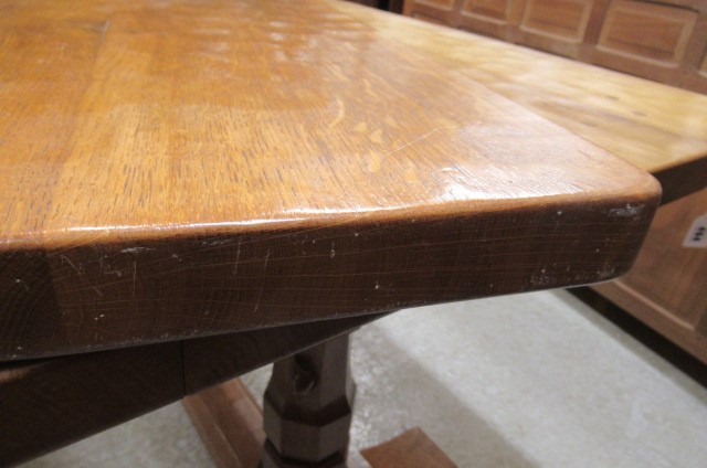 A COLIN ALMACK ADZED OAK DINING SUITE comprising multi panelled sideboard Image