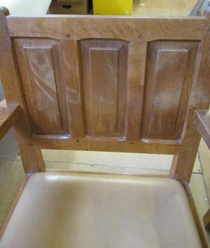 A COLIN ALMACK ADZED OAK DINING SUITE comprising multi panelled sideboard Image