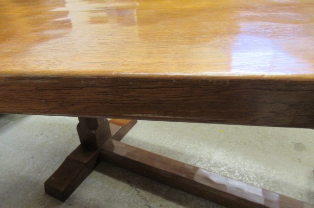 A COLIN ALMACK ADZED OAK DINING SUITE comprising multi panelled sideboard Image