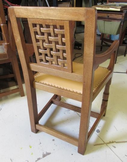 A PAIR OF ROBERT THOMPSON ADZED OAK ELBOW CHAIRS Image