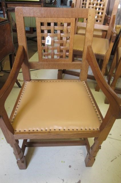 A PAIR OF ROBERT THOMPSON ADZED OAK ELBOW CHAIRS Image