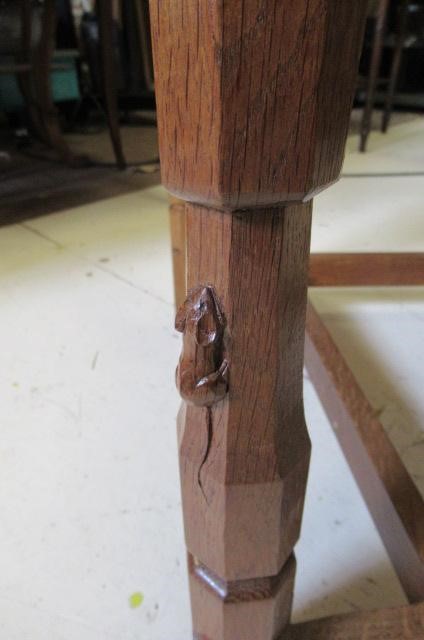 A PAIR OF ROBERT THOMPSON ADZED OAK ELBOW CHAIRS Image