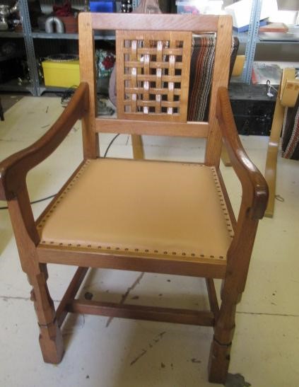 A PAIR OF ROBERT THOMPSON ADZED OAK ELBOW CHAIRS Image