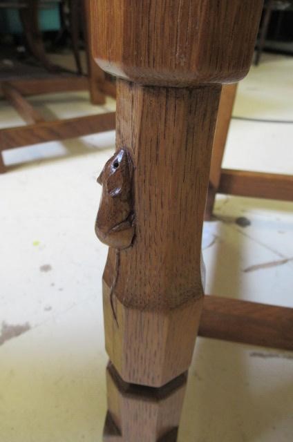 A PAIR OF ROBERT THOMPSON ADZED OAK ELBOW CHAIRS Image