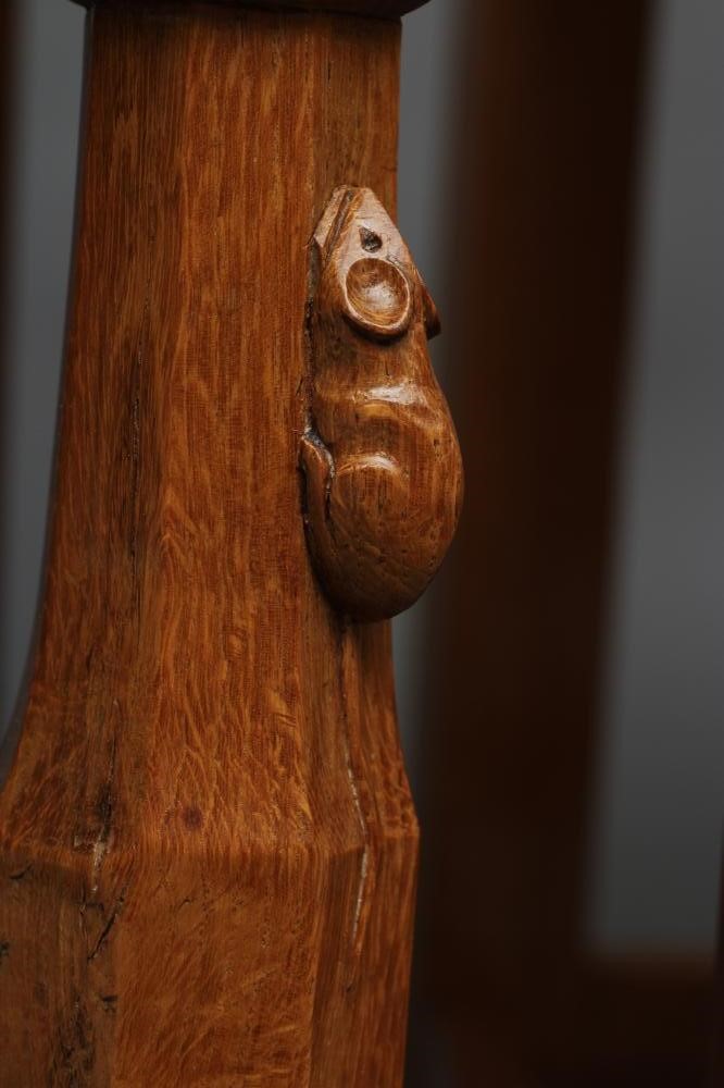 A PAIR OF ROBERT THOMPSON ADZED OAK ELBOW CHAIRS Image