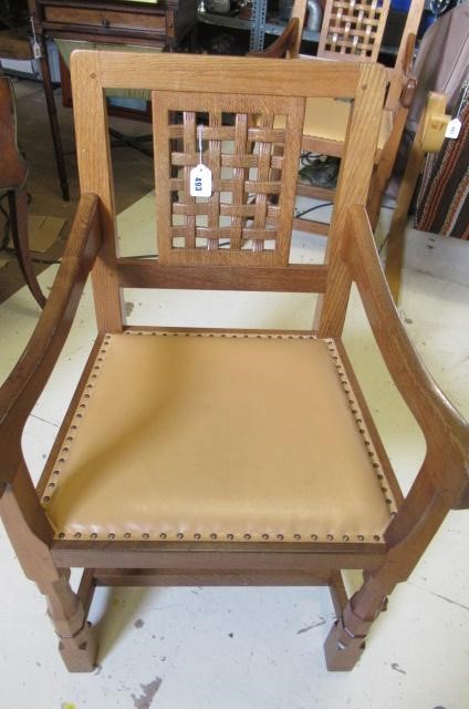 A PAIR OF ROBERT THOMPSON ADZED OAK ELBOW CHAIRS Image