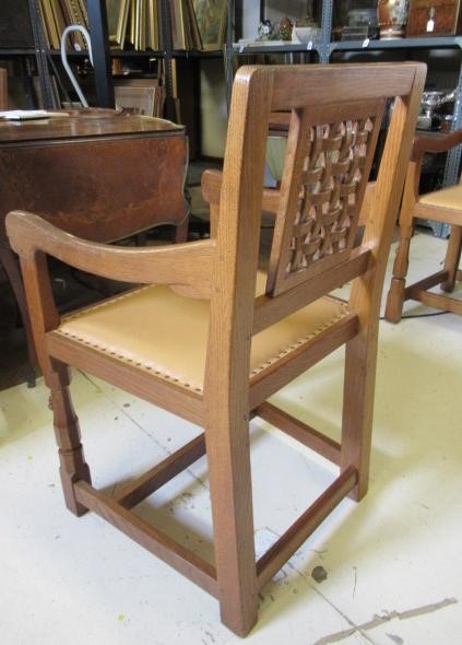 A PAIR OF ROBERT THOMPSON ADZED OAK ELBOW CHAIRS Image