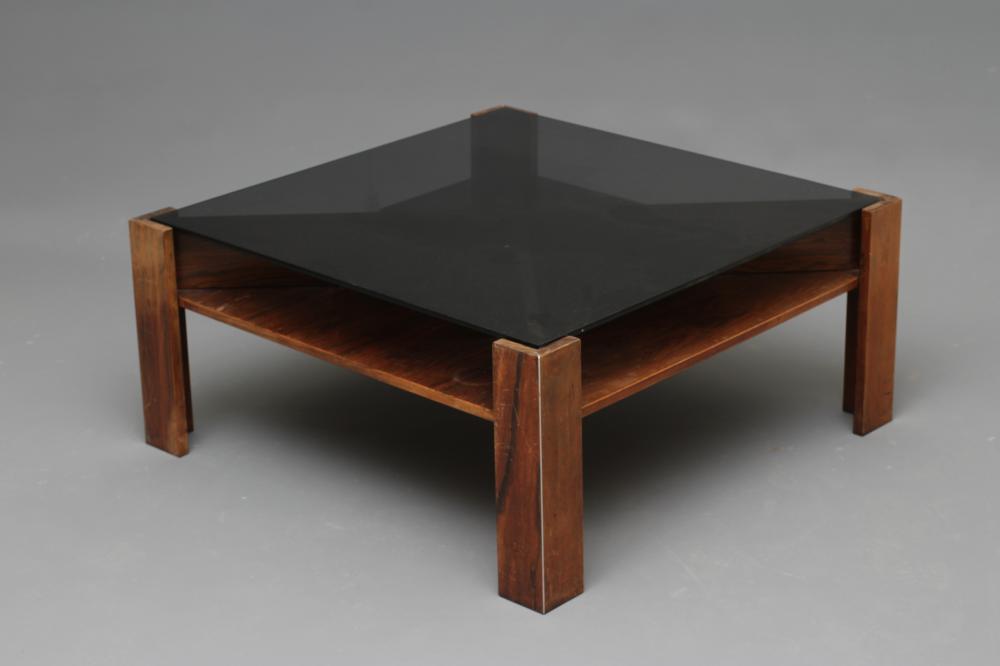 A ROSEWOOD VENEERED COFFEE TABLE Image