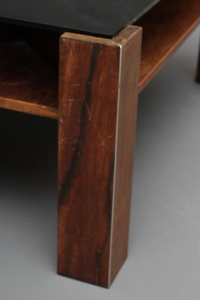 A ROSEWOOD VENEERED COFFEE TABLE Image