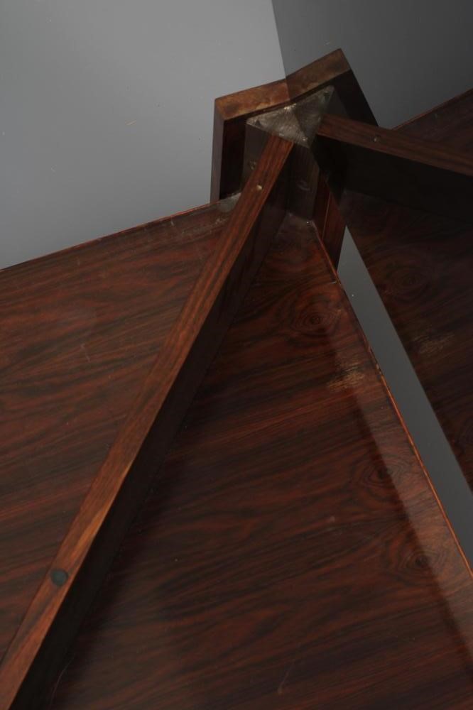 A ROSEWOOD VENEERED COFFEE TABLE Image