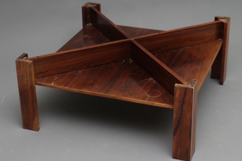 A ROSEWOOD VENEERED COFFEE TABLE Image