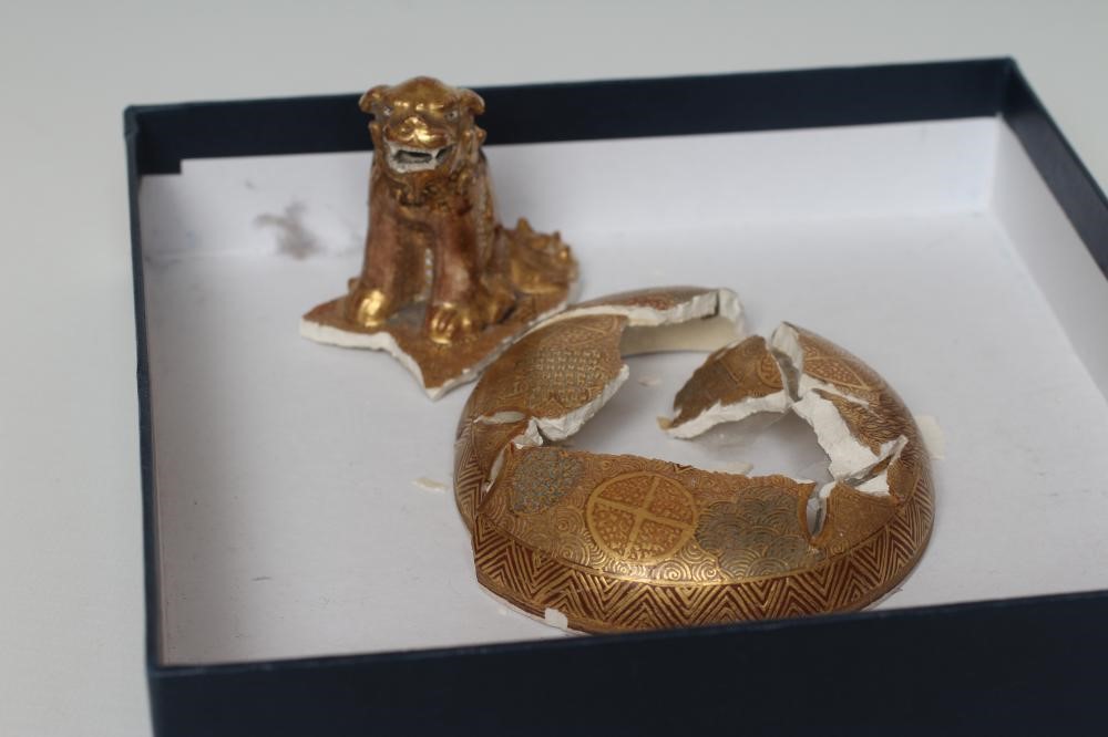 A SATSUMA EARTHENWARE VASE of rounded flared form with two dragon handles and raised upon a fixed Image