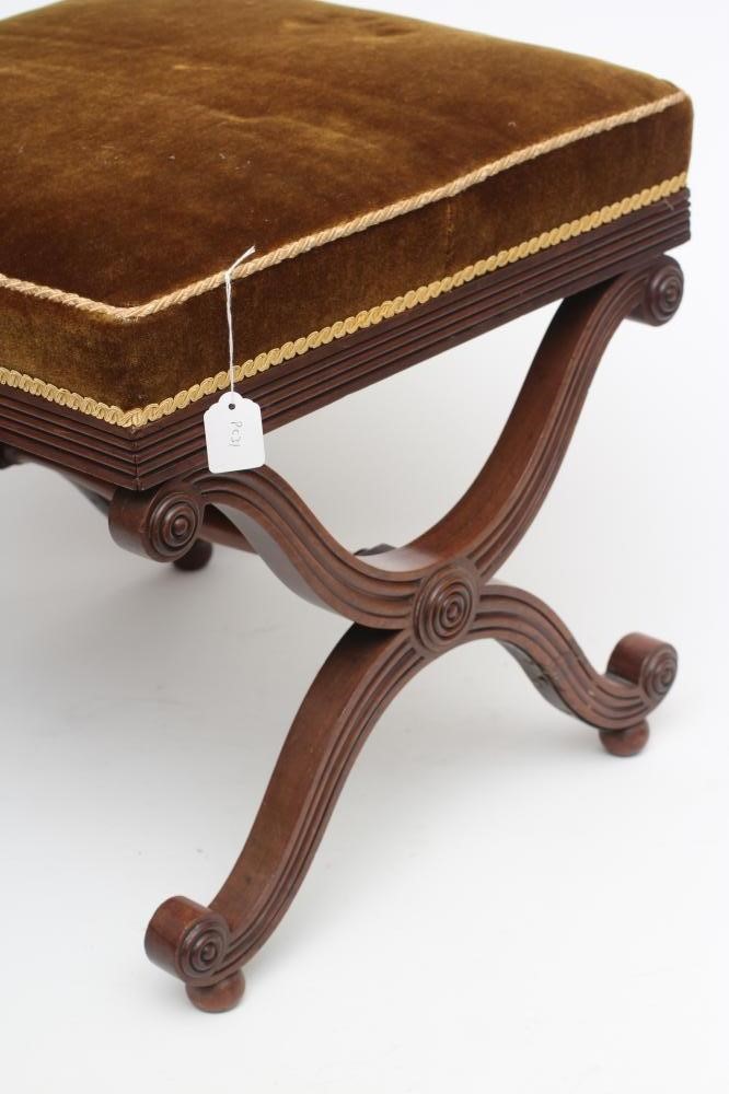A REGENCY MAHOGANY X FRAMED STOOL of square form Image