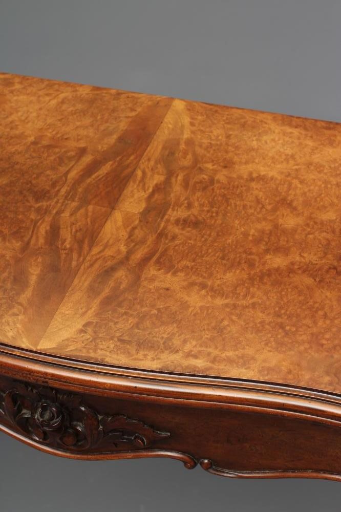 A VICTORIAN FOLDING CARD TABLE of serpentine form in the French taste Image