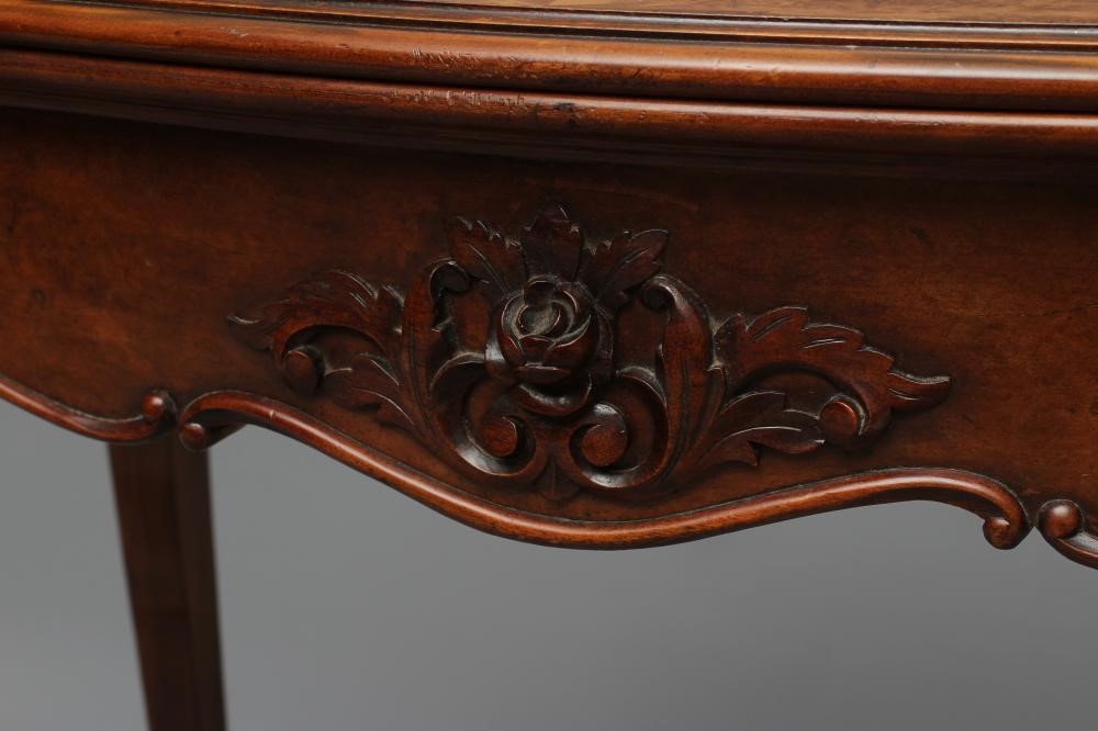 A VICTORIAN FOLDING CARD TABLE of serpentine form in the French taste Image
