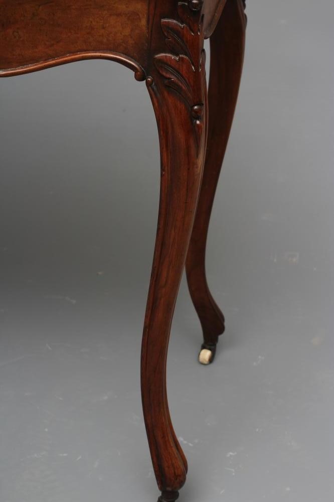 A VICTORIAN FOLDING CARD TABLE of serpentine form in the French taste Image