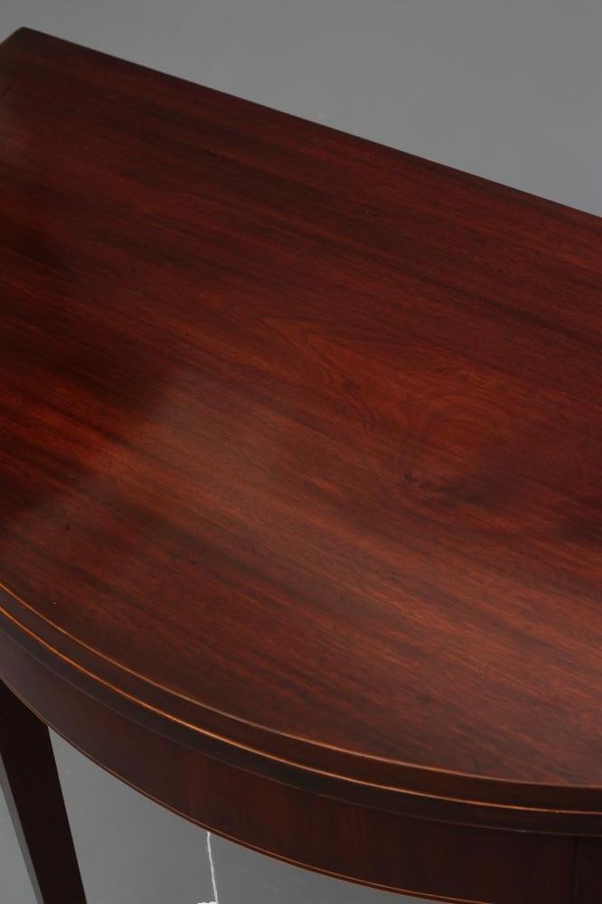 A GEORGIAN MAHOGANY FOLDING TEA TABLE Image