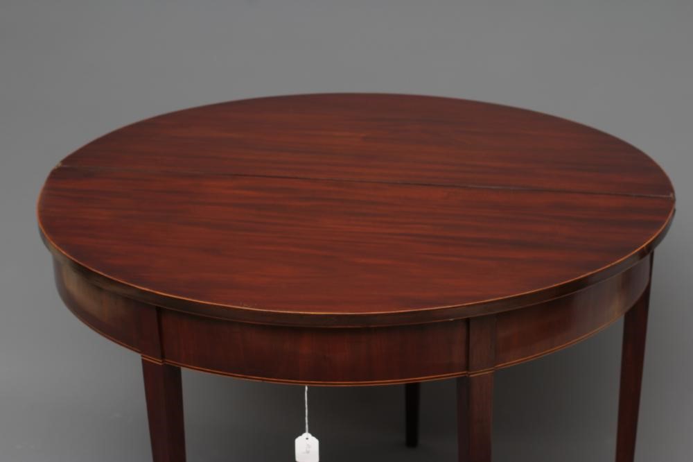 A GEORGIAN MAHOGANY FOLDING TEA TABLE Image