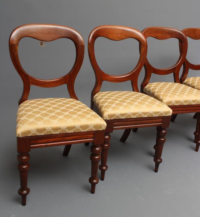 A SET OF TEN VICTORIAN MAHOGANY DINING CHAIRS of open spoonback form upholstered in a gold silk Image