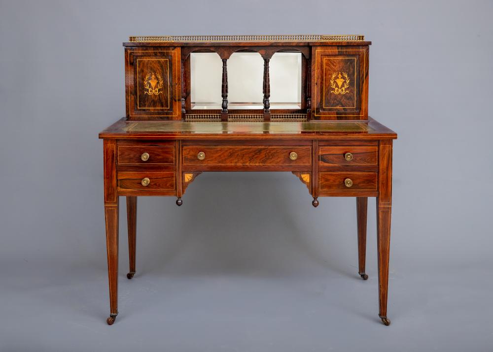 A LATE VICTORIAN SHERATON REVIVAL ROSEWOOD AND MARQUETRY WRITING TABLE Image