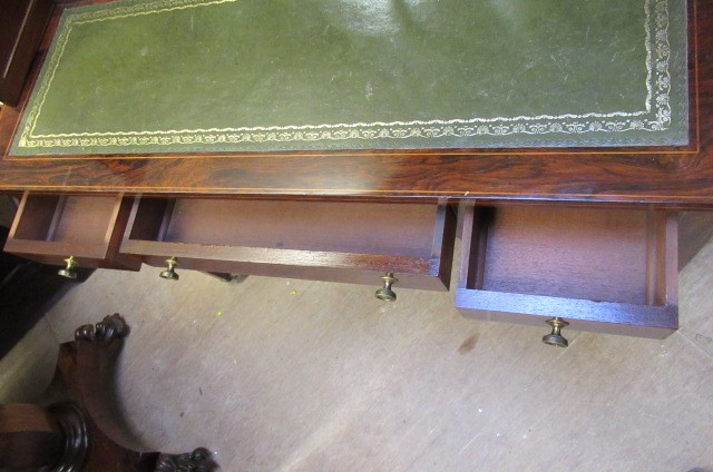 A LATE VICTORIAN SHERATON REVIVAL ROSEWOOD AND MARQUETRY WRITING TABLE Image