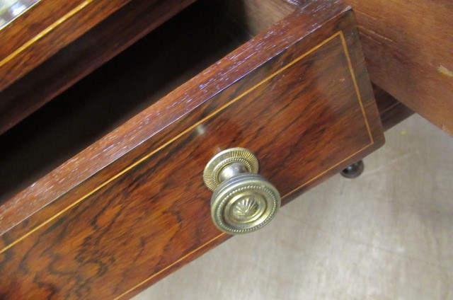 A LATE VICTORIAN SHERATON REVIVAL ROSEWOOD AND MARQUETRY WRITING TABLE Image