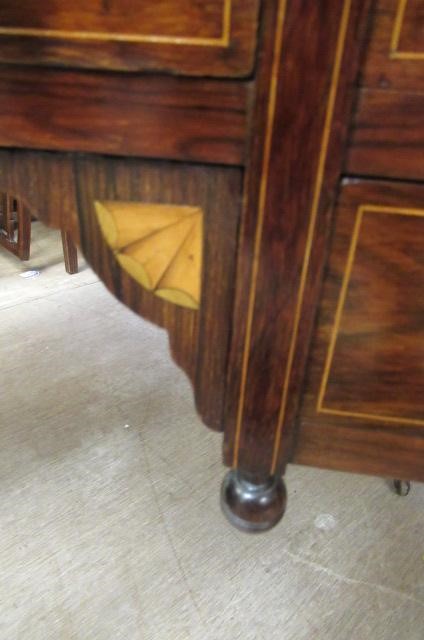 A LATE VICTORIAN SHERATON REVIVAL ROSEWOOD AND MARQUETRY WRITING TABLE Image