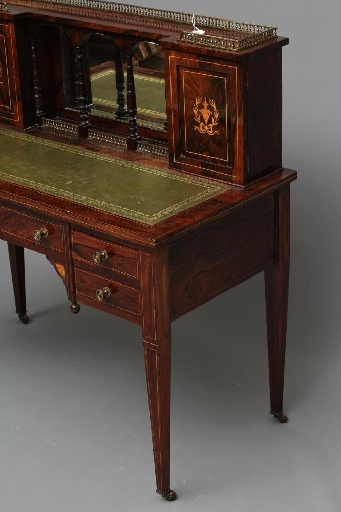 A LATE VICTORIAN SHERATON REVIVAL ROSEWOOD AND MARQUETRY WRITING TABLE Image