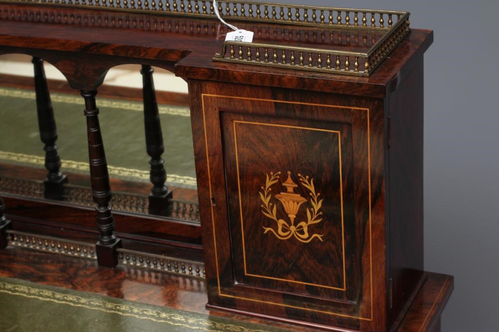 A LATE VICTORIAN SHERATON REVIVAL ROSEWOOD AND MARQUETRY WRITING TABLE Image