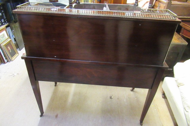 A LATE VICTORIAN SHERATON REVIVAL ROSEWOOD AND MARQUETRY WRITING TABLE Image